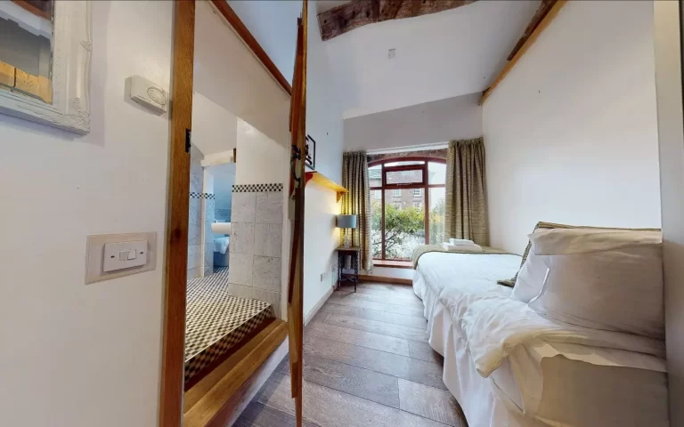 Chels Barn bedroom at Toft Estate, Peak District