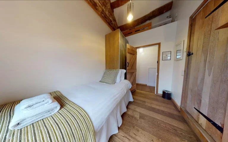 Chels Barn bedroom at Toft Estate, Peak District